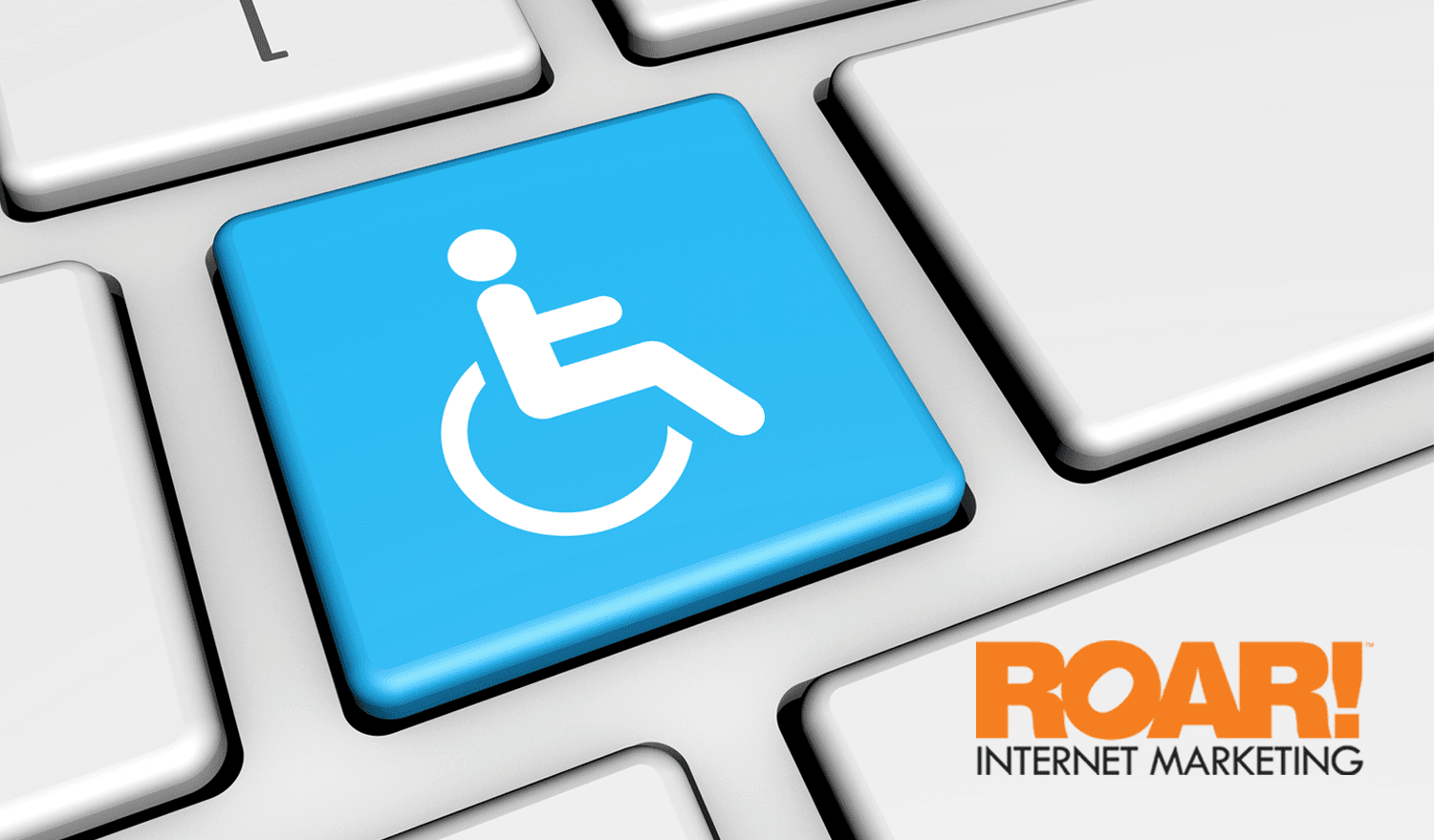 A computer keyboard with a blue accessibility key