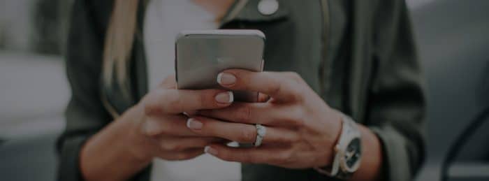 Woman Holding Mobile Phone