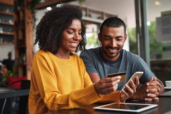 couple completing online payment