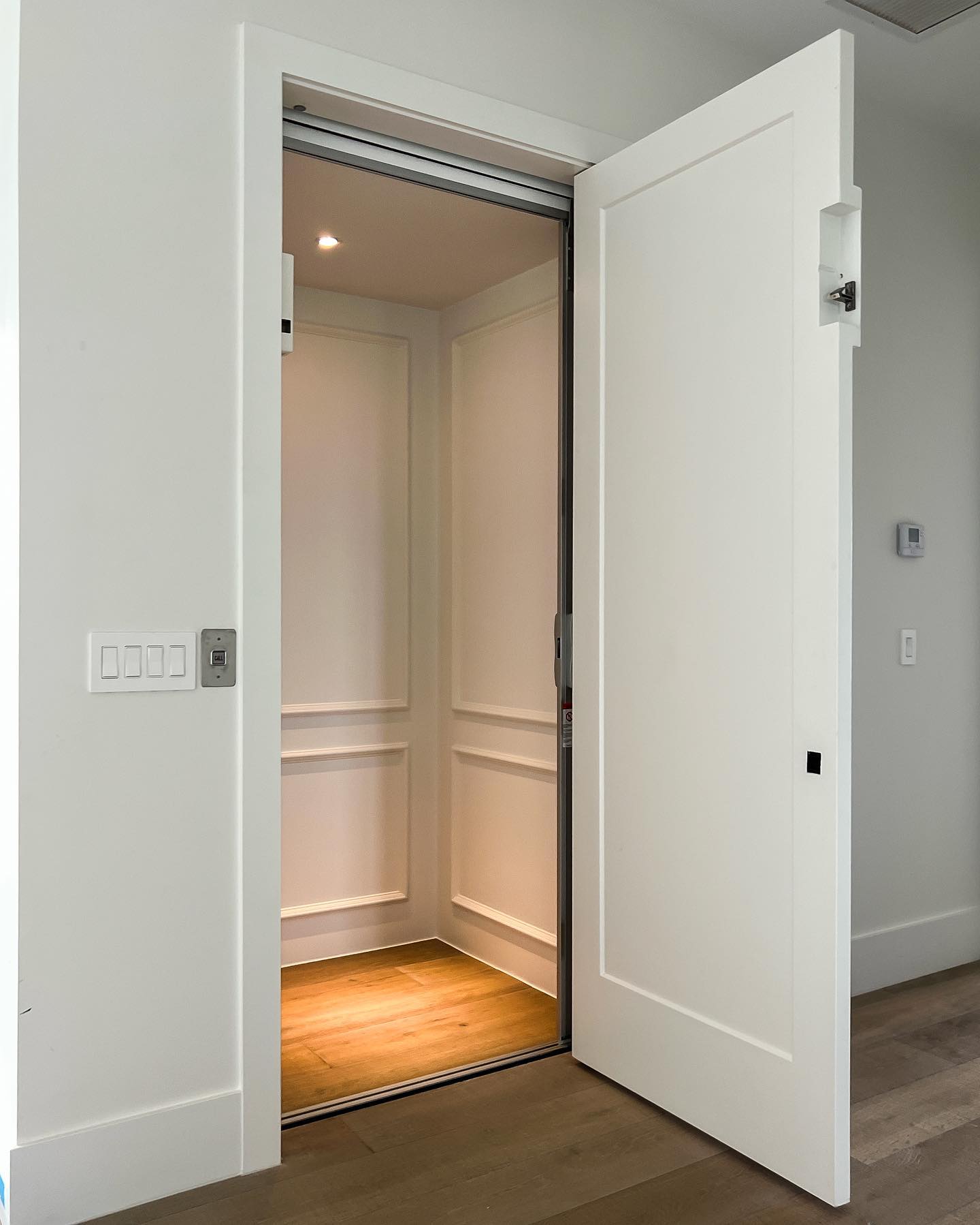 Shot of inside of a residential elevator in a home