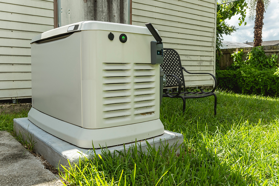 A,Home,Standby,Generator,Installed,At,The,Backyard,Of,A