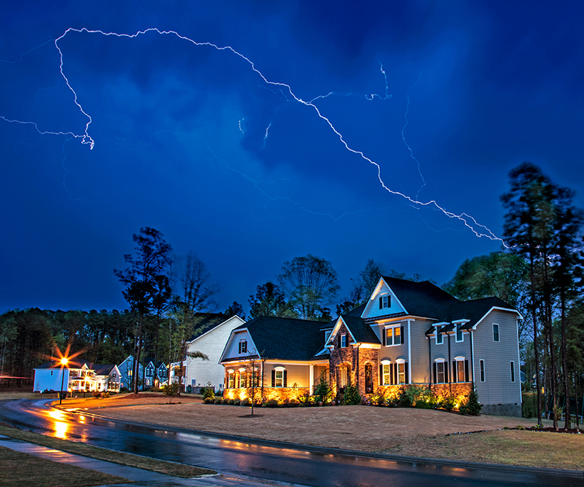 Powerful,Lightning,Storm,Front,Passes,Over,Residential,Houses,,Focus,On