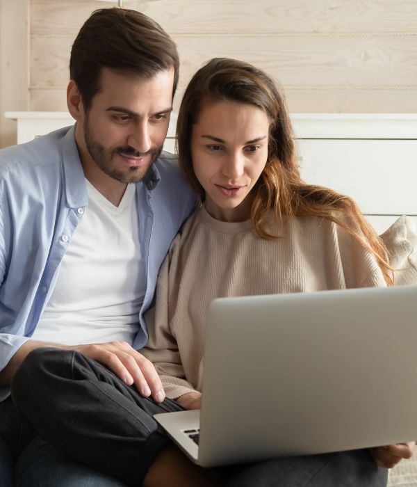 couple looking at computer