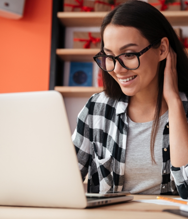 Woman looking at a laptop