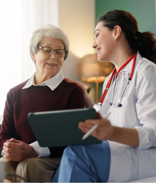 older woman with doctor